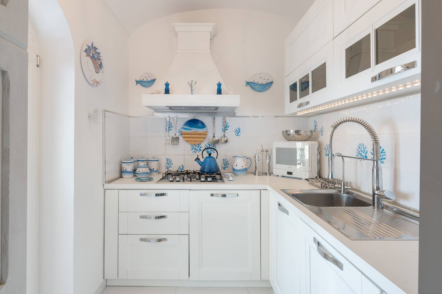 Bright Italian kitchen with modern design in Amalfi Coast villa
